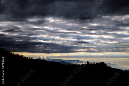 clouds over the hills, wide angle landscape photo