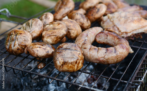 Grilled sausages and meat. Kebabs