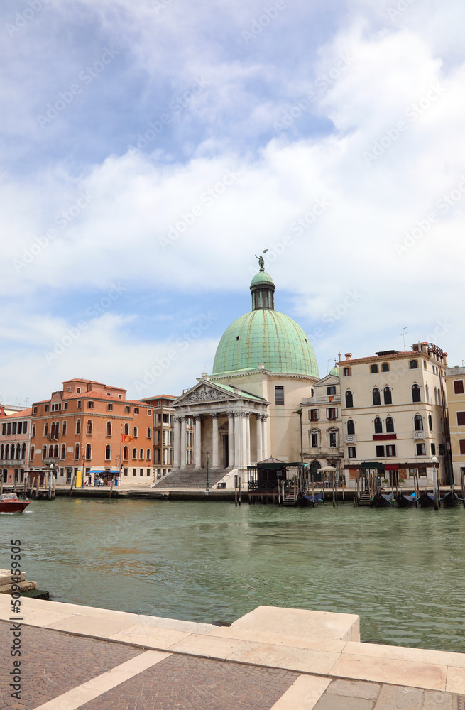 Dome of the church dedicated to Saint Simeon and Saint Giuda in Venice Island in Italy and water of Grand Canal