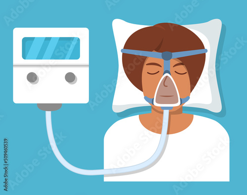 Continuous positive airway pressure.Obstructive sleep apnea.Man lying on bed.Cpap mask.Patient in hospital cpap therapy.mask fitted over a head. The guy with the oxygen mask fitted over a head.