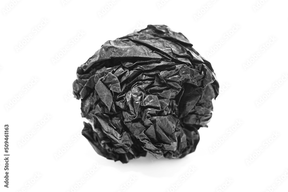 Paper. Crumpled ball of black paper on a white background