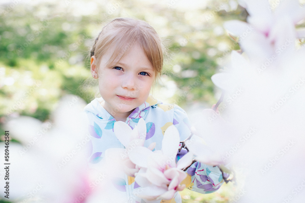 portrait of a girl with a spring flowering tree portrait of a girl with a spring flowering tree