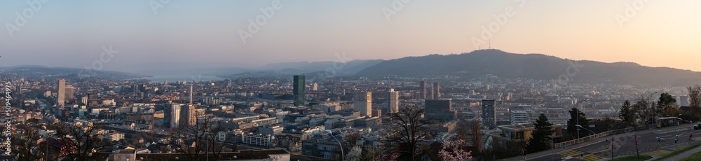 Zurich, Switzerland - March 26th 2022: Panoramic view over the city from the famous viewpoint Waid.