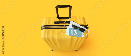 Packed suitcase with immune...