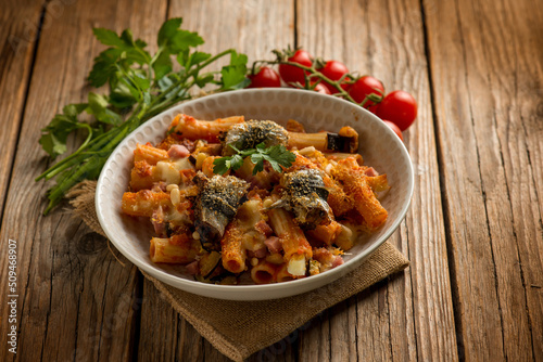 oven pasta with sardines eggplants pine nuts tomato and parsley