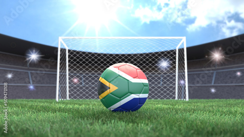 Soccer ball in flag colors on a bright sunny stadium background. South Africa. 3D image