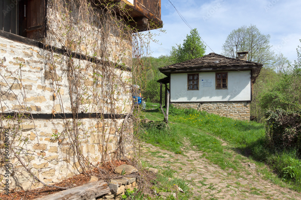 Typical street and old houses at village of Bozhentsi, Bulgaria