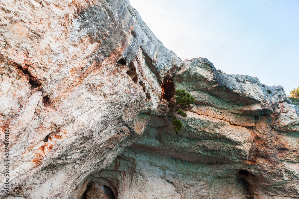 Obraz premium Coastal rocks of Zakynthos with caves, Greece