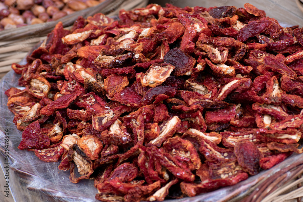 sun-dried tomatoes sold in baskets