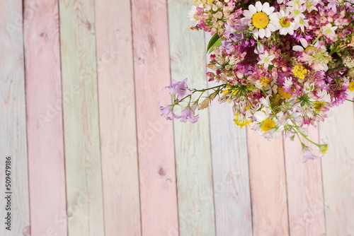 Colorful wooden table and flowers