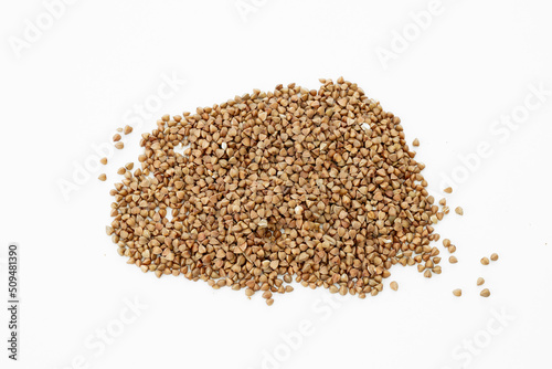 The texture of dry buckwheat. Background image of buckwheat porridge. © ALEXSTUDIO
