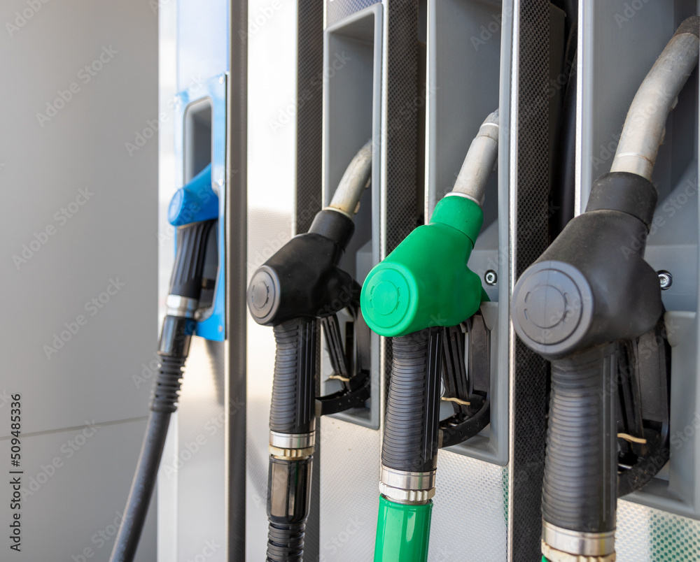 Fuel nozzles close-up on gas station. Fuel nozzles close-up on gas station.
