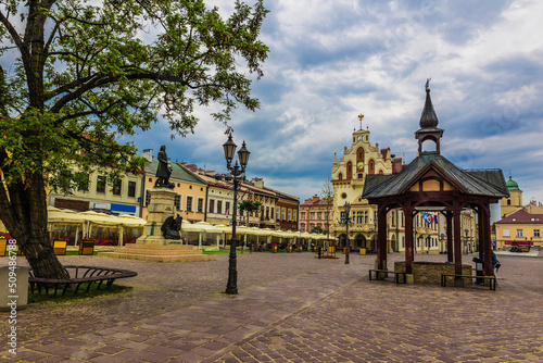 The municipal market in Rzeszów - Poland. Church of St. Adalbert and St. Stanislaus and city streets of Rzeszow - Poland photo