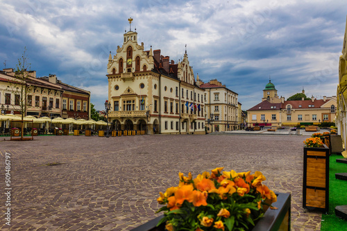 The municipal market in Rzeszów - Poland. Church of St. Adalbert and St. Stanislaus and city streets of Rzeszow - Poland photo