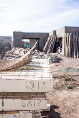 construction materials of a work in process, house and background tools