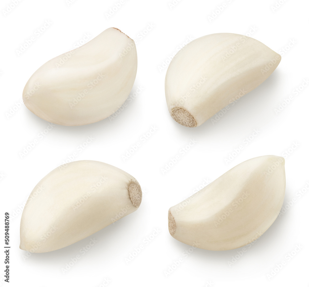 Set of delicious garlic cloves, isolated on white background Set of delicious garlic cloves, isolated on white background
