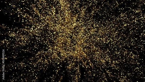 Abstract Golden glitter explosion in slow motion Bokeh background with shining defocus blurred sparkles dust macro close up with alpha channel