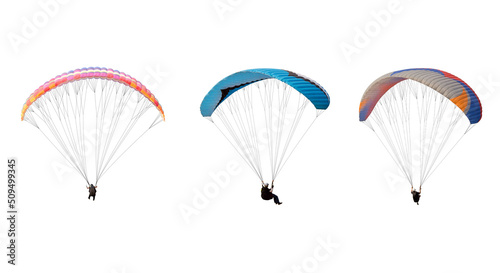 collection Bright colorful parachute isolated on white background, The sportsman flying on a paraglider. Concept of extreme sport, taking adventure challenge.