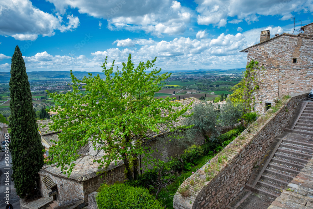 Panorama of the ancient houses and countryside surrounding the city of Assisi (Umbria Region, central Italy). Is world famous as birthplace of St. Francis, Italy's christian Patron.