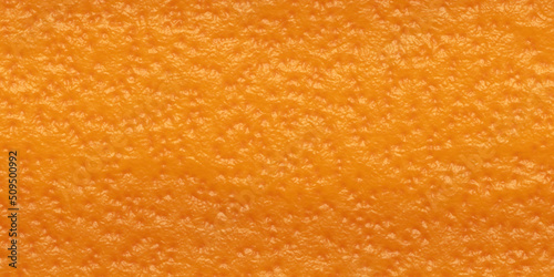 Seamless close up of orange or grapefruit peel,zest or rind texture. Bright citrus fruit skin tileable repeat background. Summer,health or orange juice concept. High resolution 3D Rendering. . photo