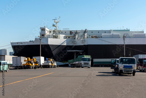 RORO ship and trailer , wharf with cargo ship waiting: Shipping industry photo