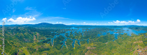 Morning at the Ta Dung lake or Dong Nai 3 lake with green hills and mountains. Travel and landscape concept. Travel concept. photo