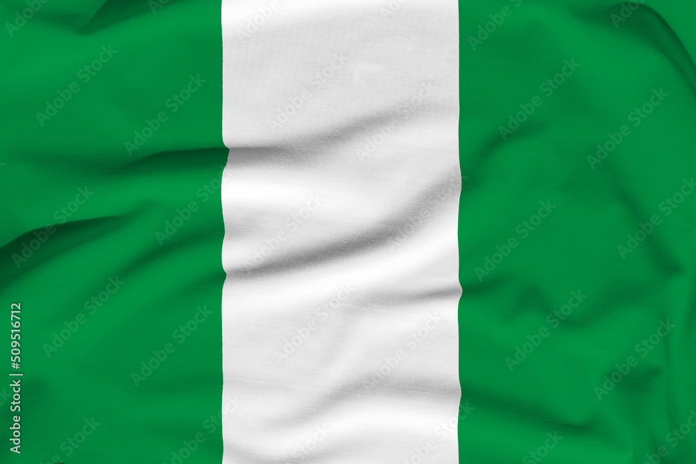 Nigeria national flag, folds and hard shadows on the canvas