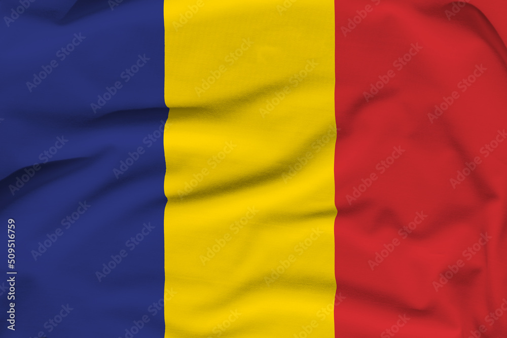 Romania national flag, folds and hard shadows on the canvas Romania national flag, folds and hard shadows on the canvas