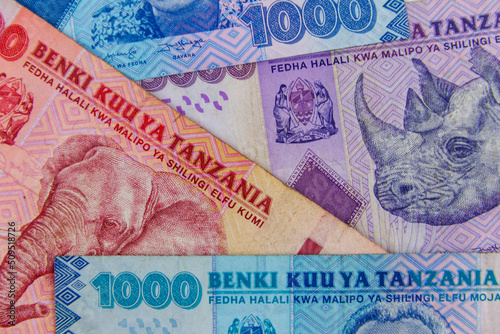 Obraz na plátně Background of the different tanzanian shillings banknotes
