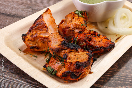 Indian cuisine - tandoori chicken tikka photo