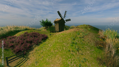 丘の上に建つ古い風車