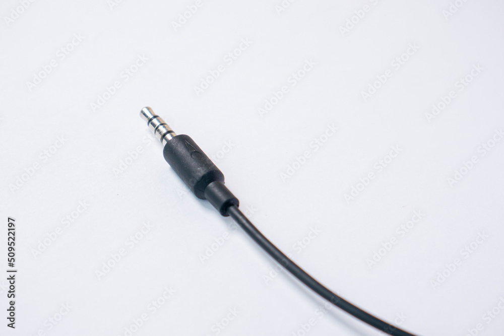 TRRS audio jack with braided cable isolated on white background TRRS audio jack with braided cable isolated on white background