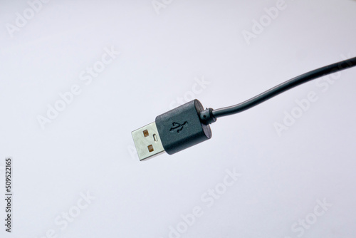 USB type A with black cable isolated on white background photo