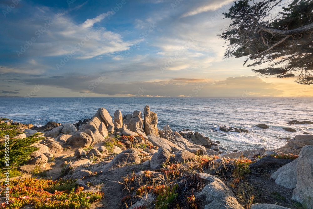 Monterey - view of the coast at sunset.