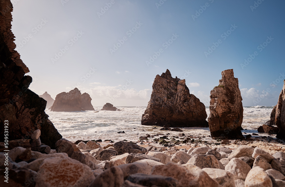 Atlantic ocean beach on the rock coast. Portugal.