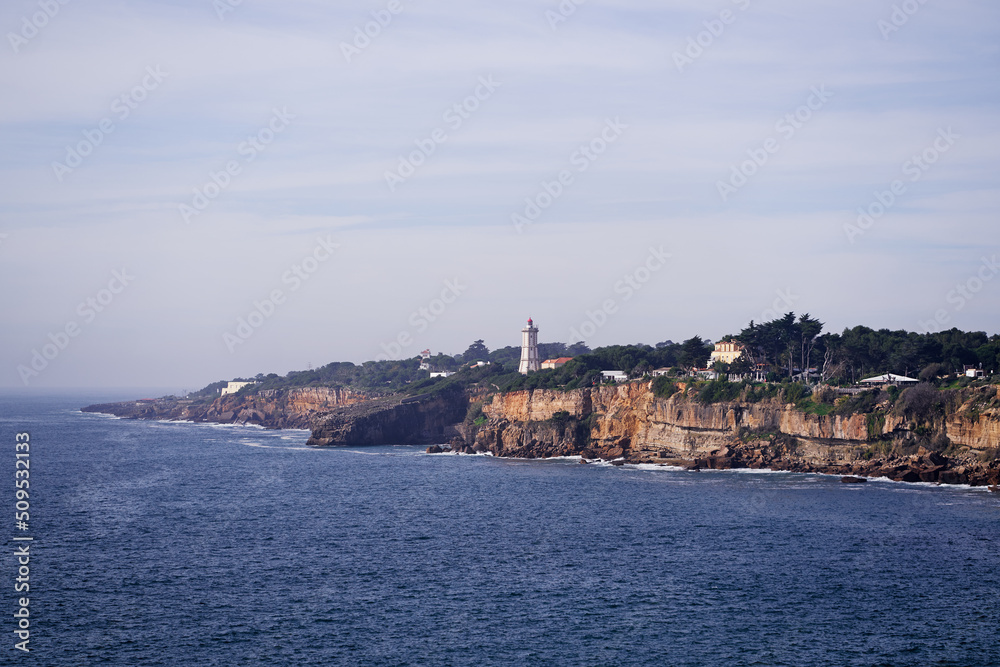 Guia Lighthouse. Cascais rock coast of Atlantic Ocean, Portugal.