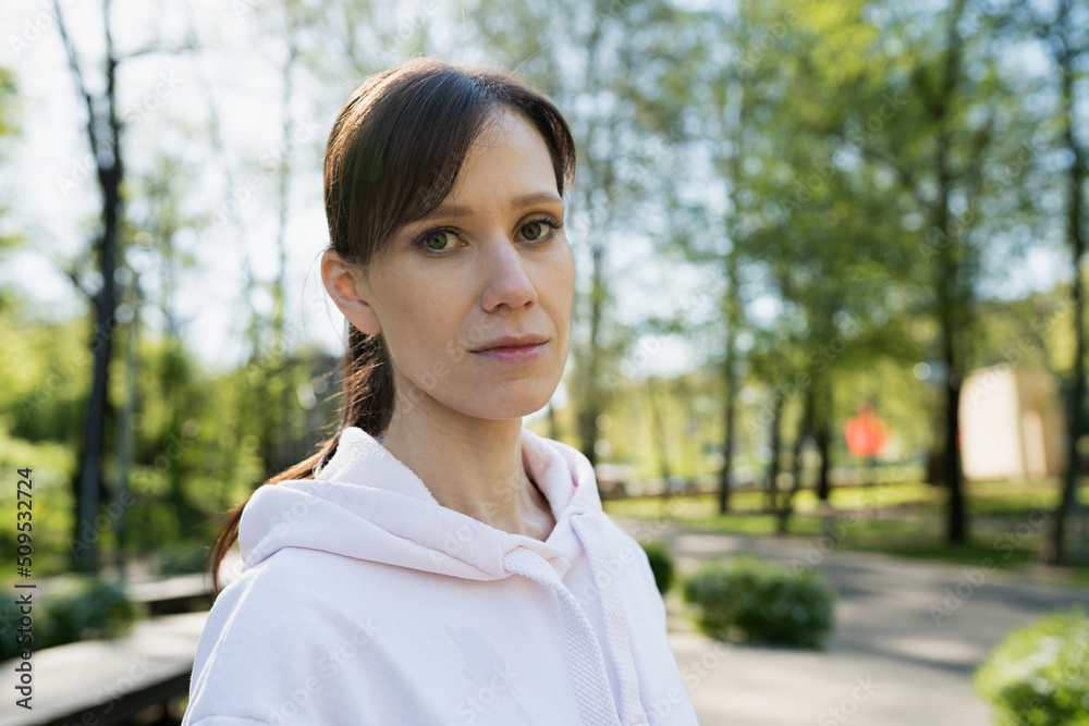 White woman in park close-up at morning White woman in park close-up at morning