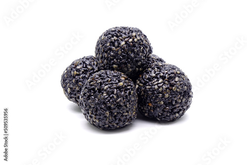 Black sesame balls isolated on white background. Black sesame ball, Chinese super food reduce oxidation in the body, improve blood pressure, and provide antioxidants that help fight cancer