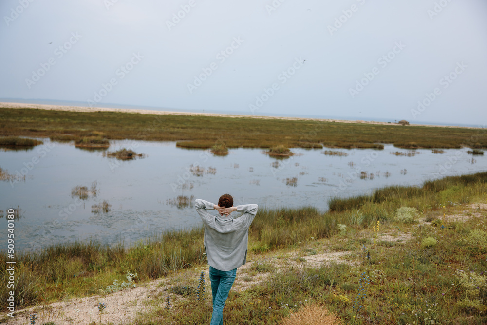 woman outdoors lake walk travel landscape woman outdoors lake walk travel landscape