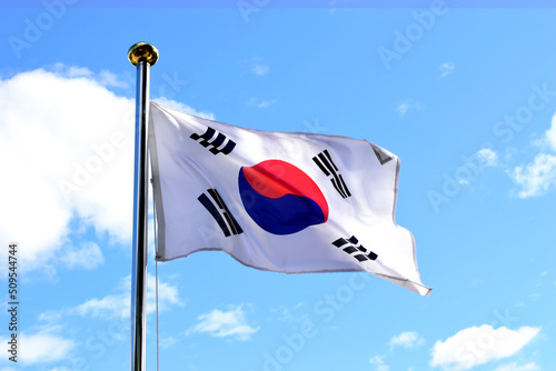 바람에 역동적으로 펄럭이고있는 한국의 국기인 태극기 photo