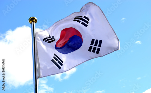 바람에 펄럭이고있는 한국의 국기인 태극기 photo