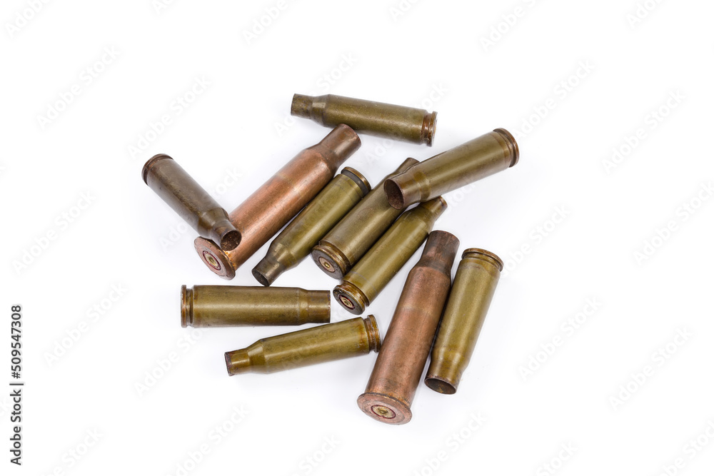 Spent shells from assault rifles different caliber on white background Spent shells from assault rifles different caliber on white background