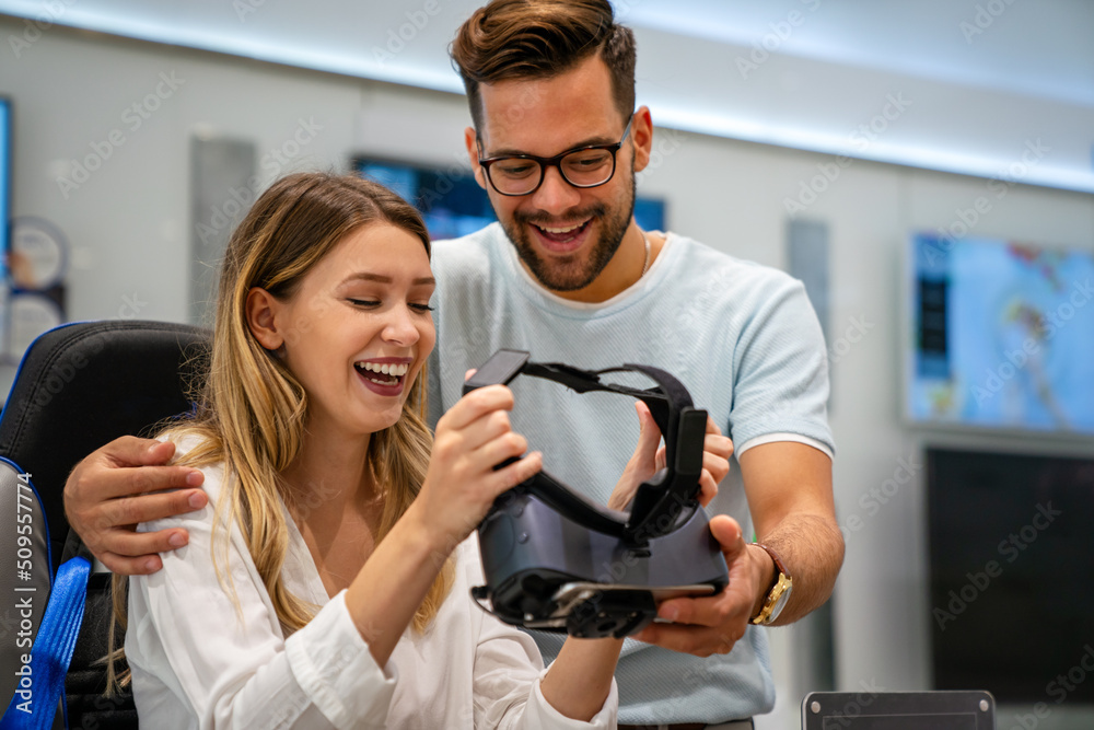 Group of people using virtual reality headset at exhibition, show. VR technology simulation concept Group of people using virtual reality headset at exhibition, show. VR technology simulation concept