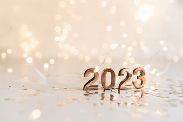 happy new year 2022 background new year holidays card with bright lights,gifts and bottle of hampagne