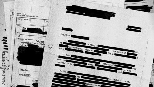 Redacted document montage with photocopy textures photo