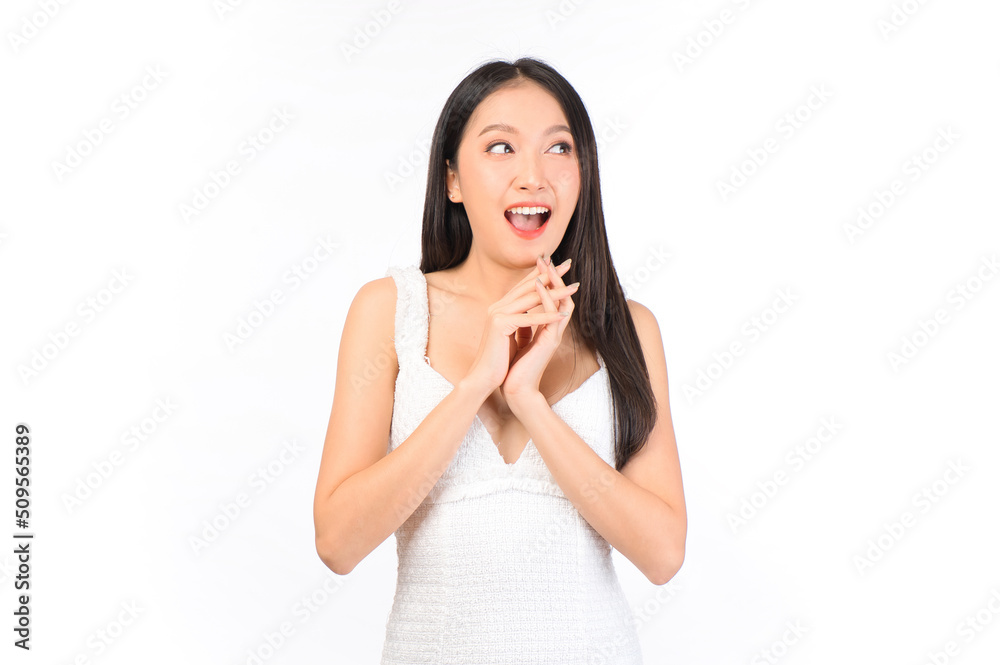 Portrait of young beautiful sexy asian woman wearing a white dress pose with empty space. Portrait of young beautiful sexy asian woman wearing a white dress pose with empty space.