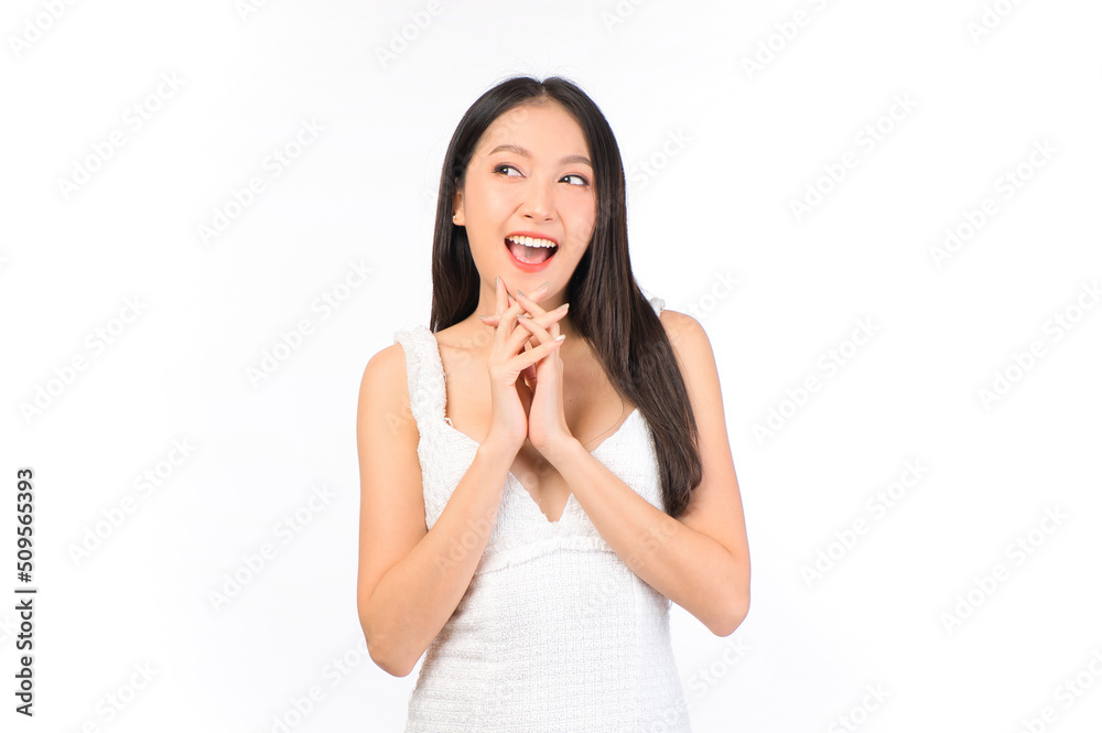 Portrait of young beautiful sexy asian woman wearing a white dress pose with empty space. Portrait of young beautiful sexy asian woman wearing a white dress pose with empty space.