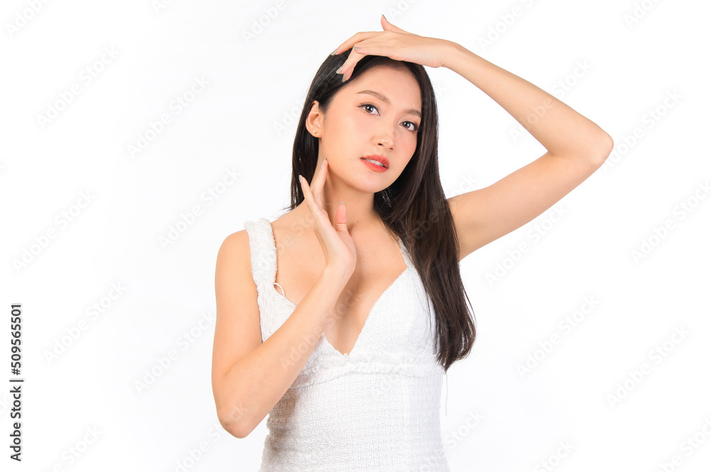 Portrait of young beautiful sexy asian woman wearing a white dress pose with empty space. Portrait of young beautiful sexy asian woman wearing a white dress pose with empty space.