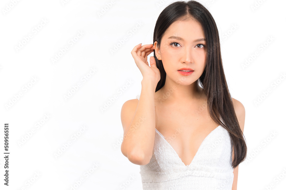 Portrait of young beautiful sexy asian woman wearing a white dress pose with empty space. Portrait of young beautiful sexy asian woman wearing a white dress pose with empty space.
