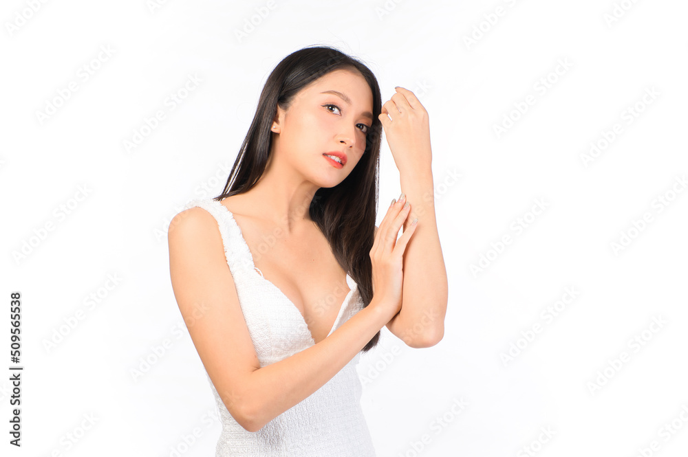 Portrait of young beautiful sexy asian woman wearing a white dress pose with empty space. Portrait of young beautiful sexy asian woman wearing a white dress pose with empty space.